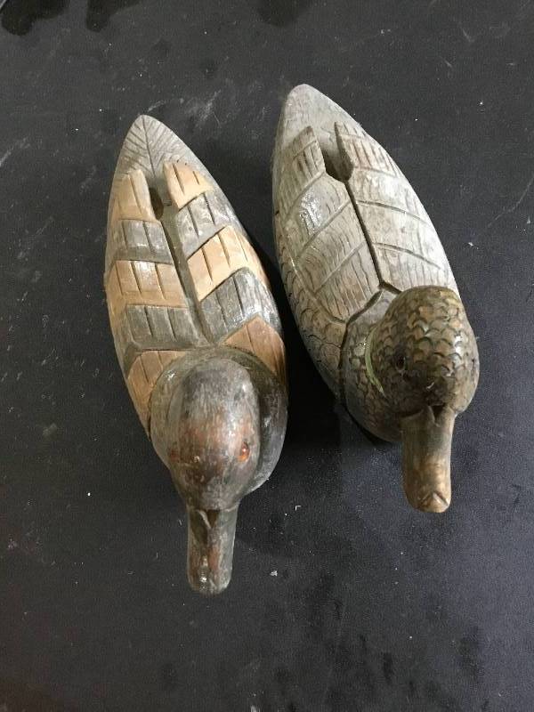 2 hand carved and painted wooden ducks.