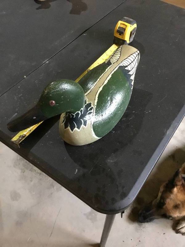 Hand carved and painted wooden duck.  About 17 long.