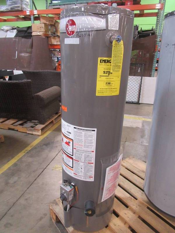 lot 16 image: Rheem 29 Gallon, 32,000 BTU Natural Gas Water Heater, PROG29-32N RH62 - Damage on Top and Bottom of Heater