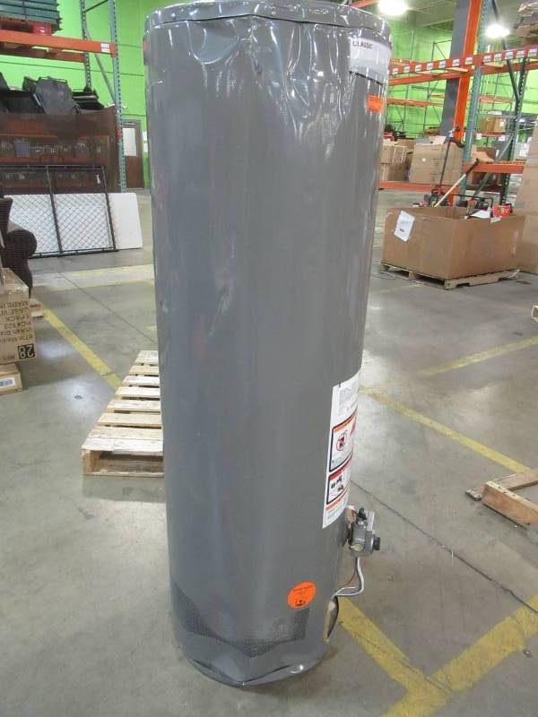 lot 18 image: Rheem Professional Classic 40 Gal. Tall 40,000 BTU Atmospheric Residential Natural Gas Water Heater, PROG40-40N RH62 - Dents on Top and Bottom of casing.