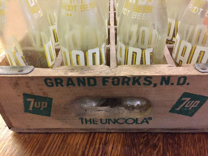 lot 33 image: Wood Tote Full of Dads Root Beer Bottles