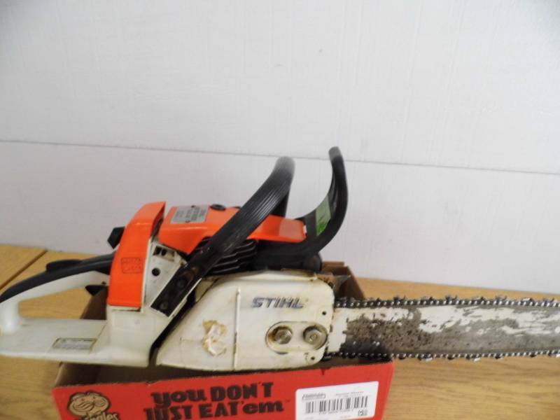 lot 97 image: Stihl Wood Boss Chain Saw