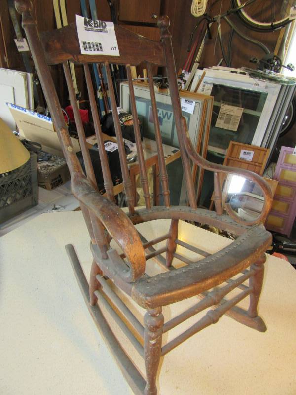 lot 117 image: Solid wood childs rocker.. A PROJECT.  Needs work