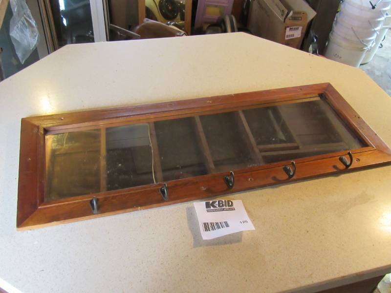 lot 125 image: Mirror with coat hooks..