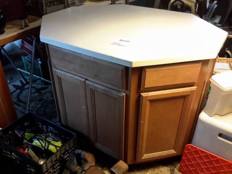lot 19 image: Octagon shaped Island cabinet