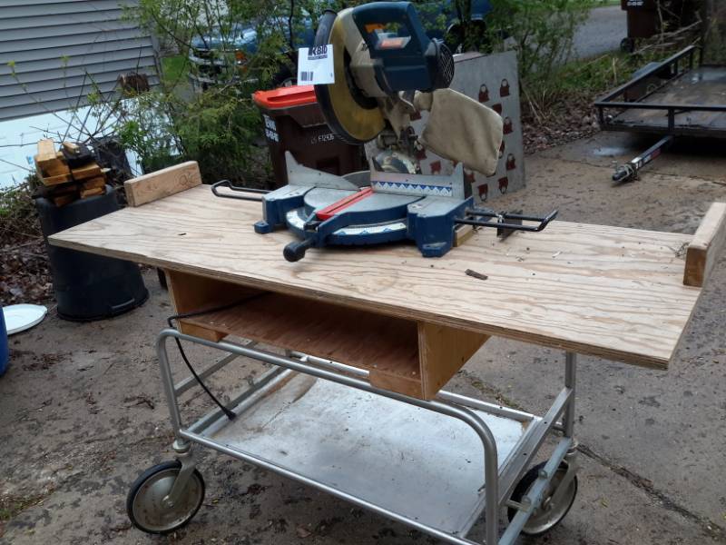 lot 3 image: Ryobi, Miter Saw and Rolling Table