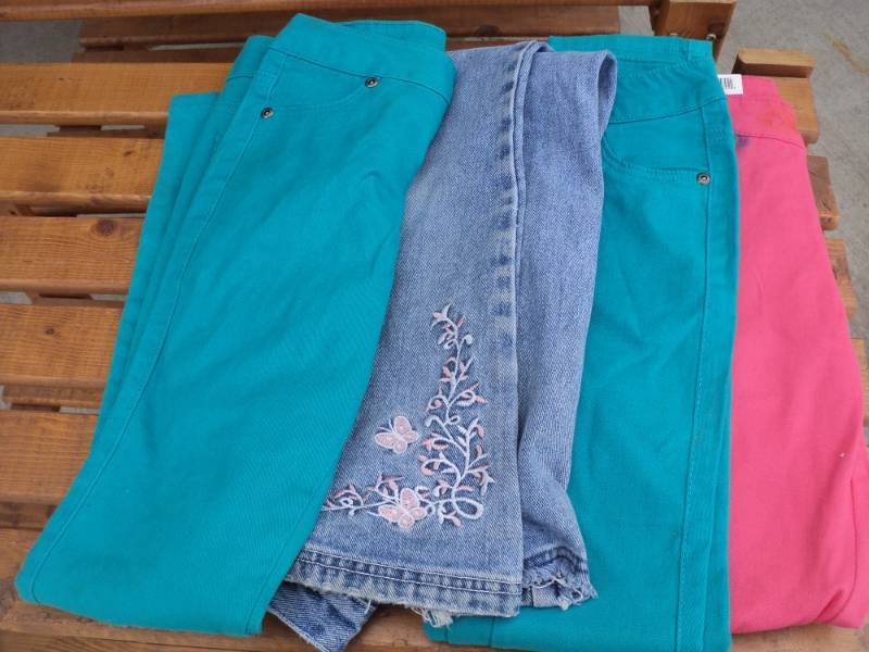 lot 54 image: New Size 8 Girls 4 pairs Jeans...