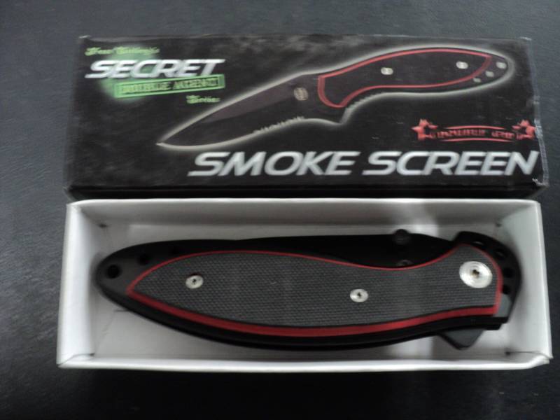 lot 158 image: Secret Smoke Screen Knife...