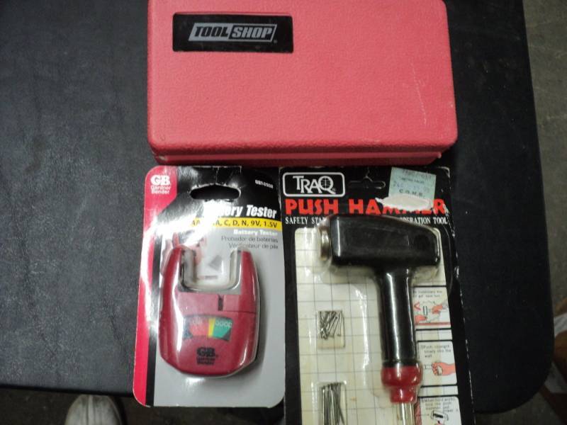 lot 215 image: 10 pc Hole Saw Kit, Battery Tester-...