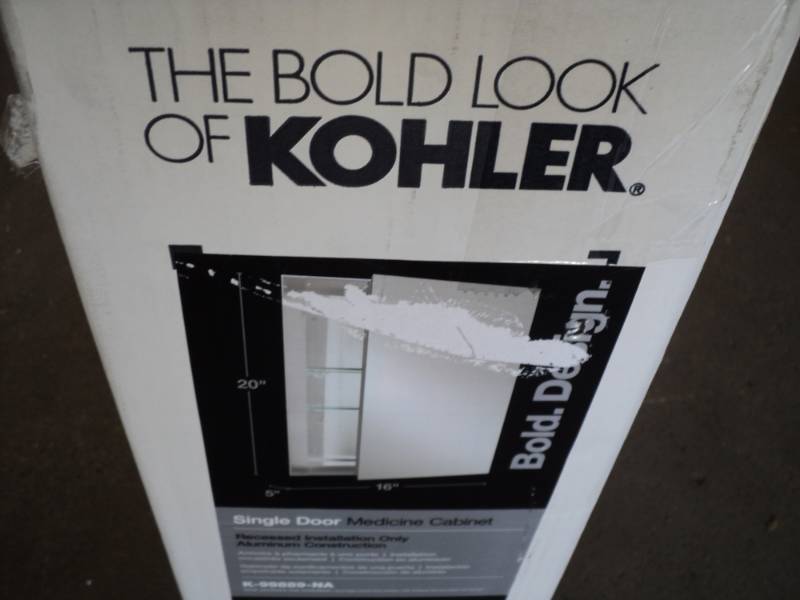 lot 395 image: Kohler Single Door Medicine Cabinet...