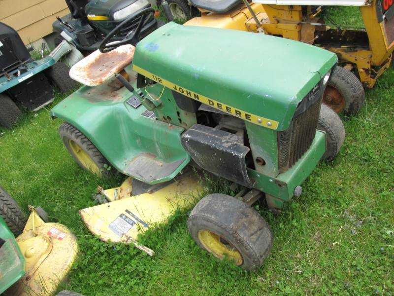 lot 12 image: John Deere 112 with mower deck, Koh...