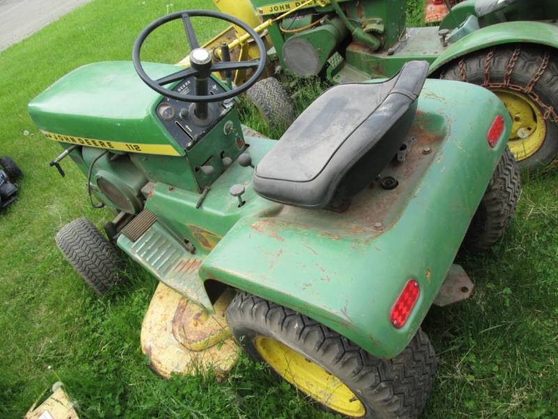 lot 14 image: John Deere 112 with mower with deck...