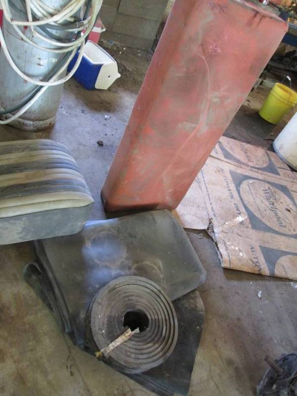 lot 83 image: Bulk rubber, vintage seat cushions...