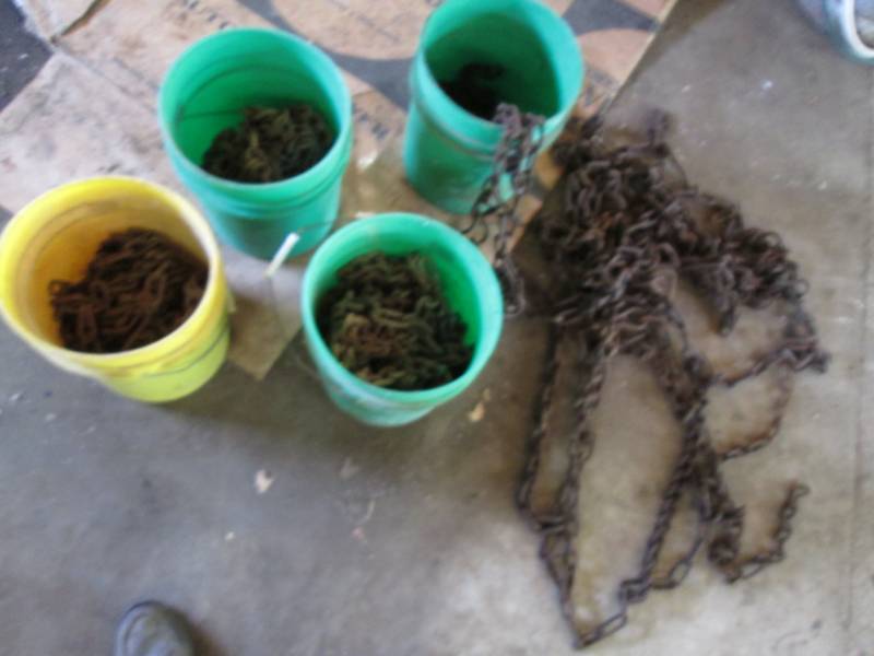 lot 87 image: 4 Buckets of tire chains...