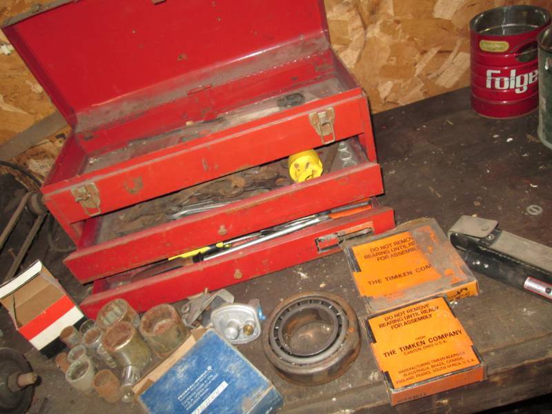 lot 108 image: Red tool box with misc. tools, sock...