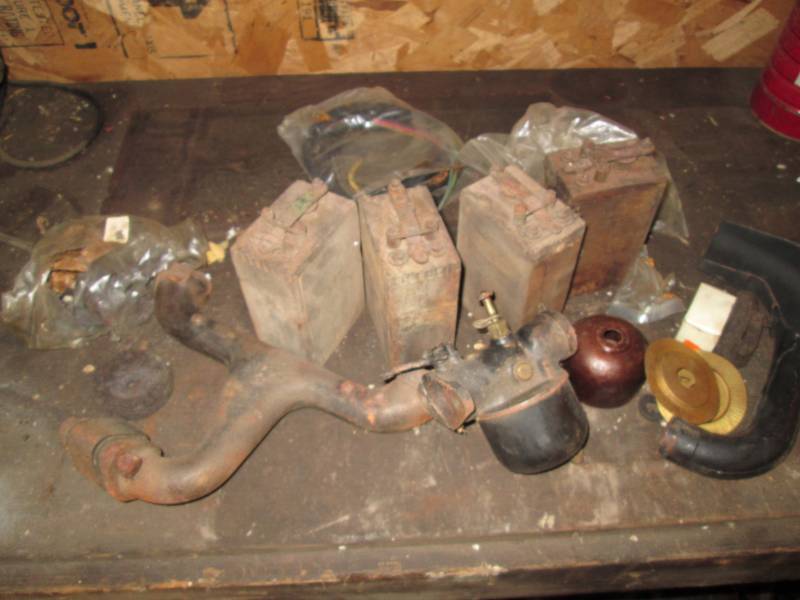 lot 112 image: Model T carburator, intake manifold...