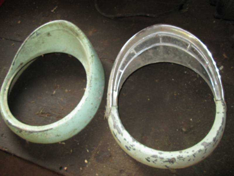 lot 116 image: Ford Fairlane headlight bezels...