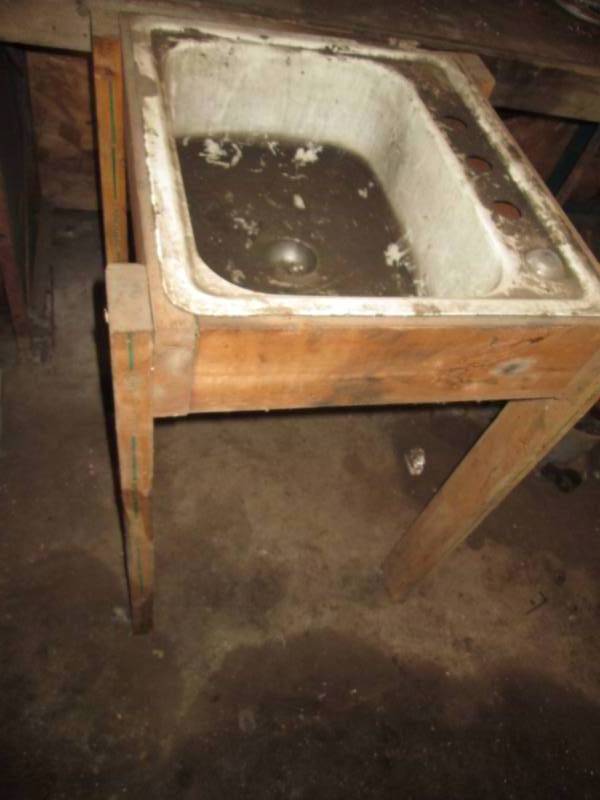 lot 128 image: Utility sink in wood frame, metal s...