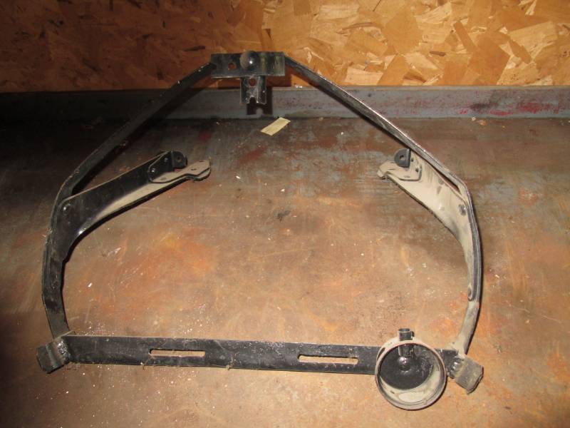 lot 131 image: Model T spare tire rack...