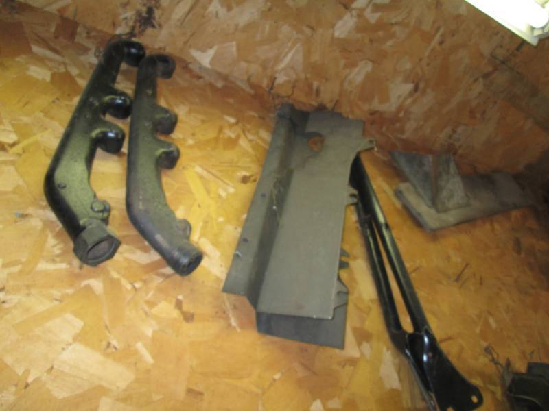 lot 133 image: Model T manifolds and body panels -...