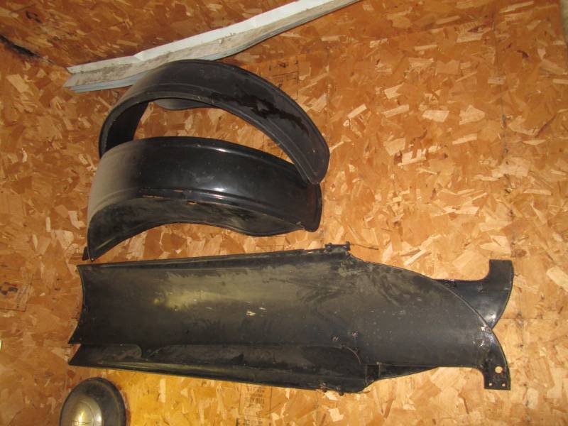 lot 139 image: Model T rear fenders (2) body panel...