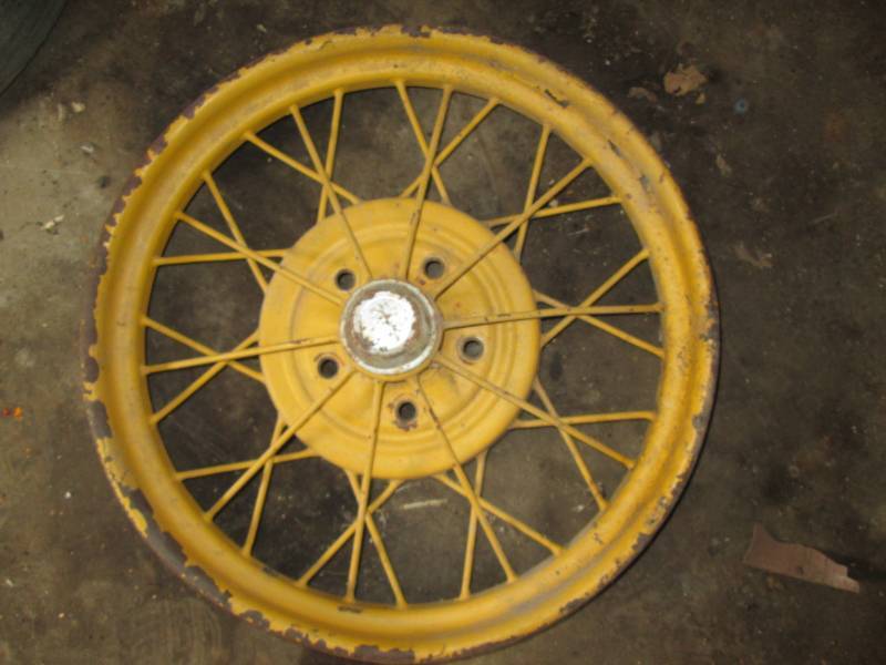 lot 144 image: Ford Vintage metal spoke rim...