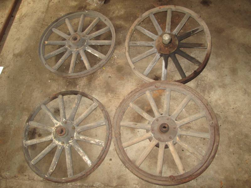 lot 143 image: 4 Model T rims, wooden...
