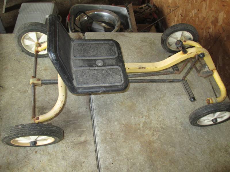 lot 147 image: Yellow metal peddle car...