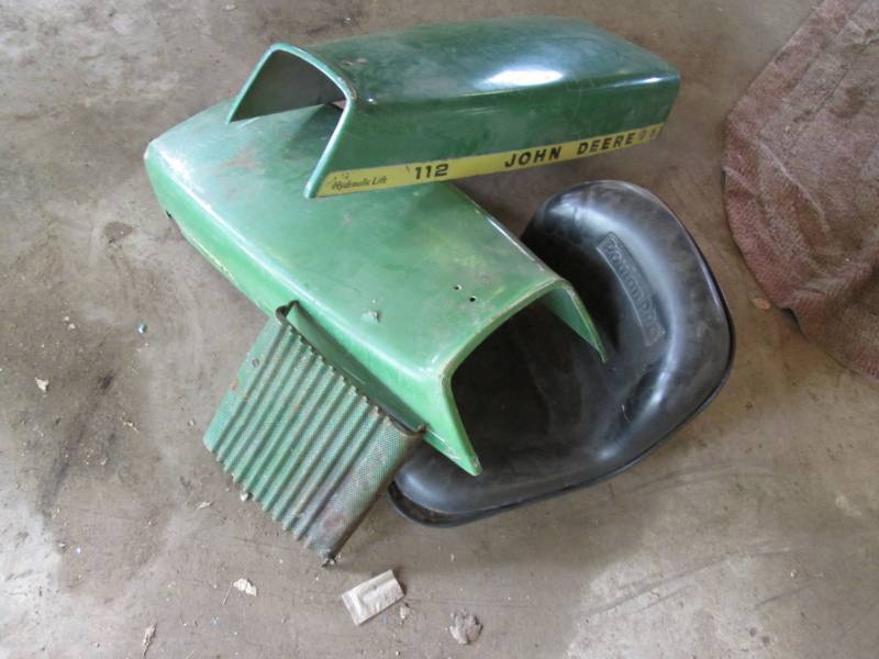 lot 152 image: John Deere riding lawn mower hoods,...