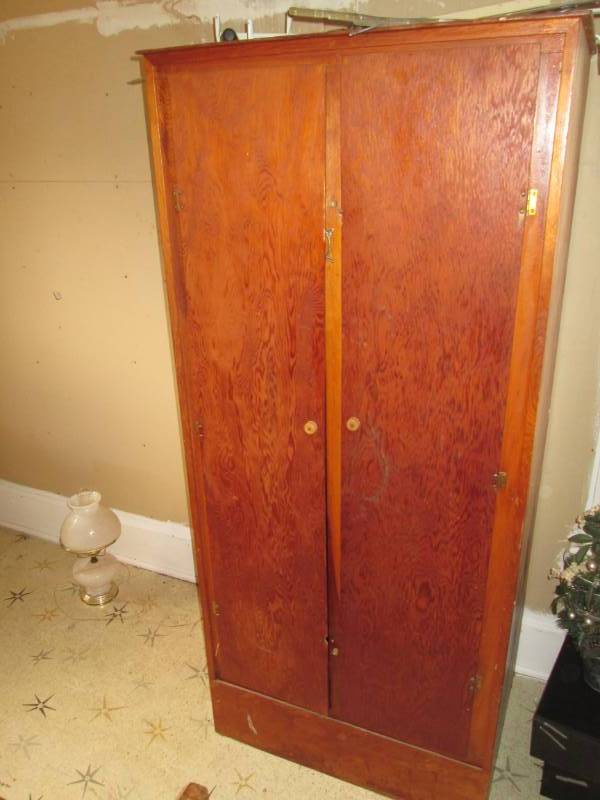 lot 187 image: Wood closet cabinet...