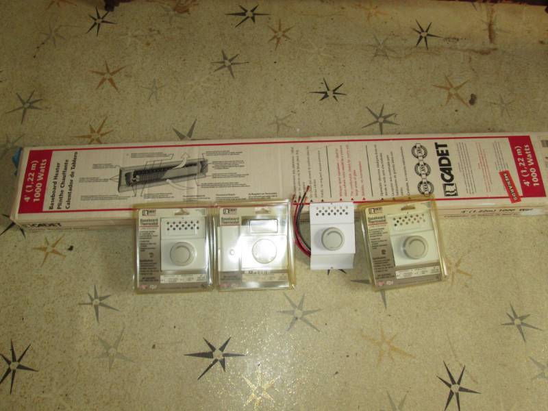 lot 190 image: Baseboard heater amd thermostat...