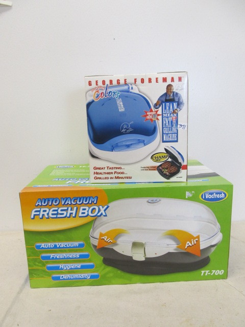 lot 124 image: 2 New in Box Items - Foreman Grill & Fresh Box Auto Vacuum