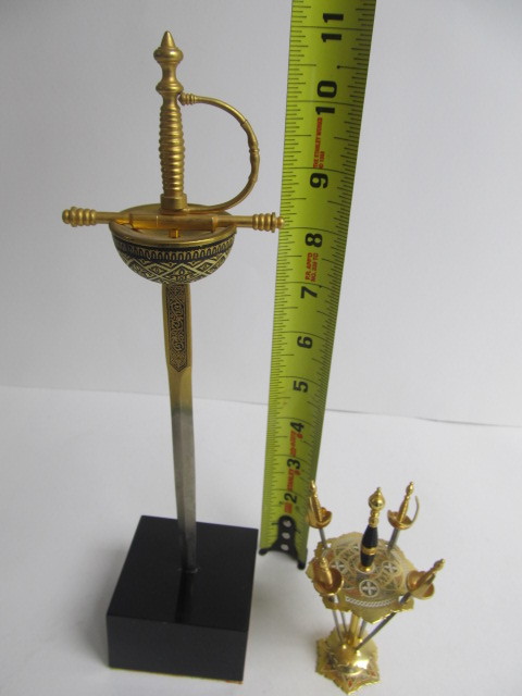 lot 262 image: Vintage Toledo Spanish Metal Sword Toothpick Holder etc