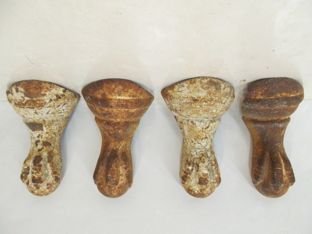 lot 230 image: Set of 4 Antique Cast Iron Claw Foot Bathtub Feet