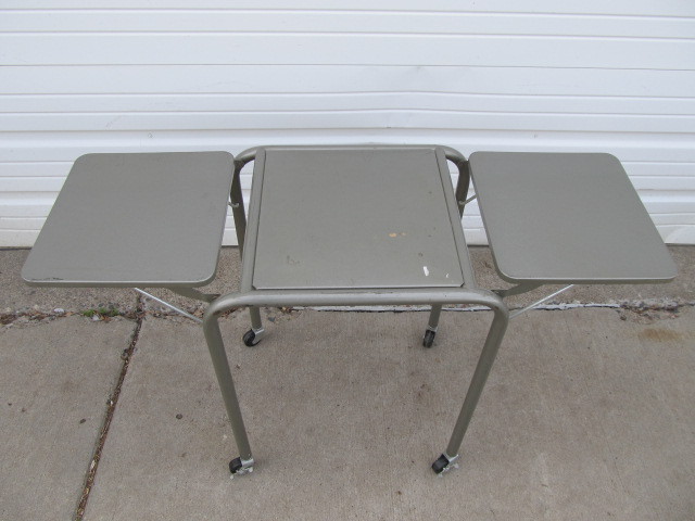 lot 239 image: Vintage Rolling Industrial Typewriter Table