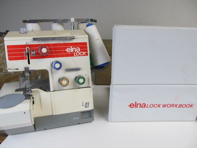 lot 278 image: ELNA Lock Serger wLARGE Lot of Sewing Supplies