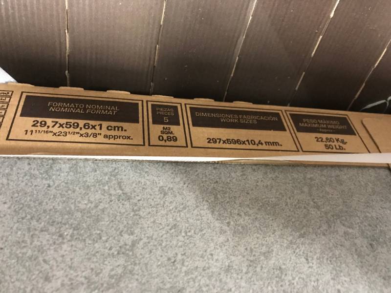 lot 22 image: 12 x 24 Grey Tile Approx 360sqft 1 Pallet