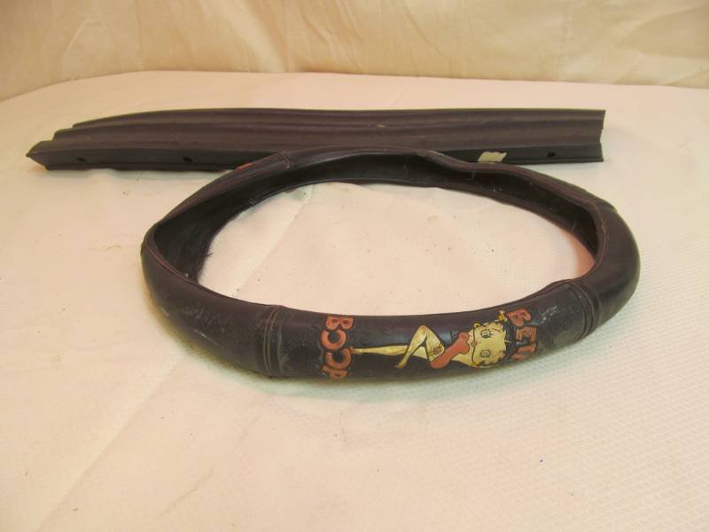 lot 8 image: Rubber Bumper, Betty Boop steering wheel cover