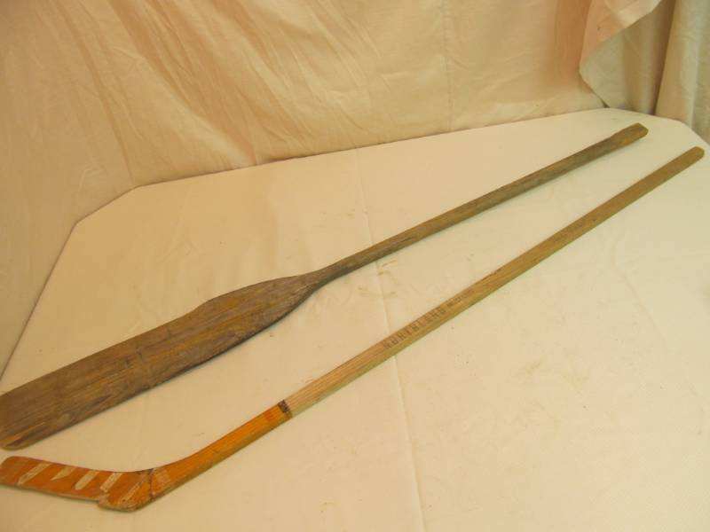 lot 28 image: vintage oar, hockey stick