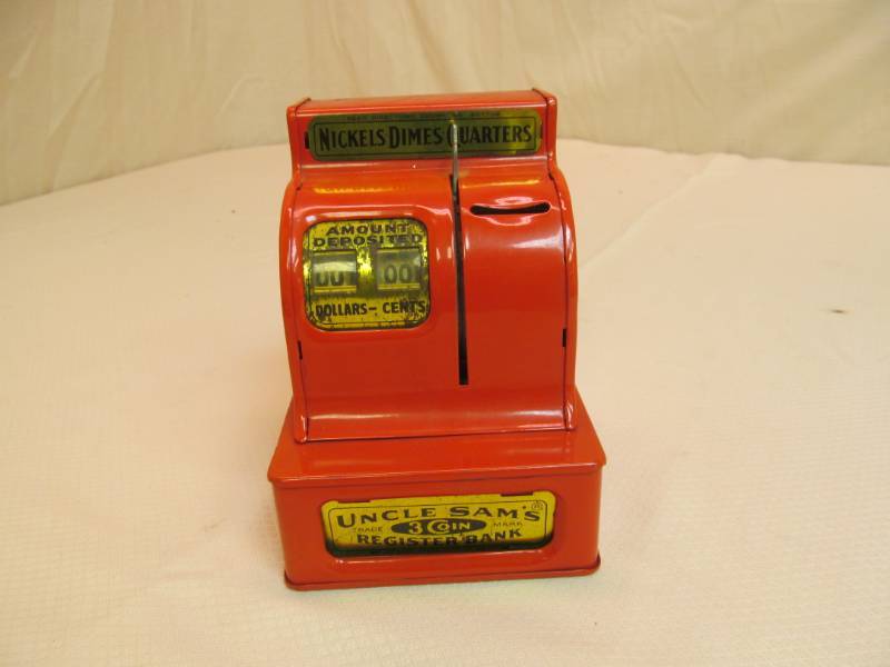lot 85 image: Uncle Sams Vintage Coin Registure Bank