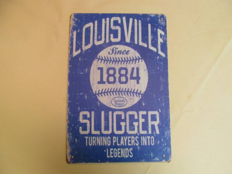 lot 120 image: Metal Sign- Louisville Slugger