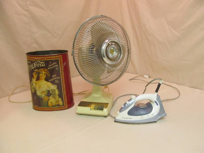lot 140 image: Coca Cola Trash Can, 16 Oscilating Fan, Rowenta Power Press Iron