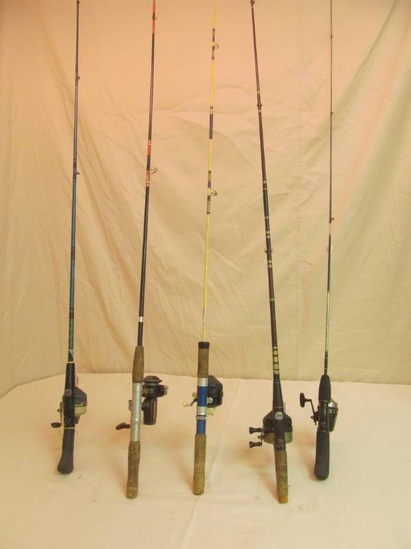 lot 146 image: Group of 5 fishing rods and reels on most