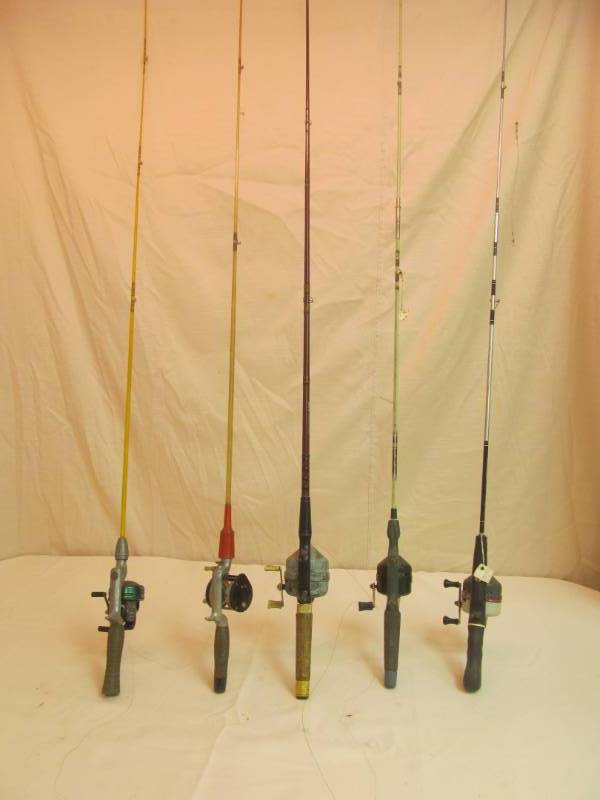 lot 148 image: Group of 5 fishing rods and reels on most
