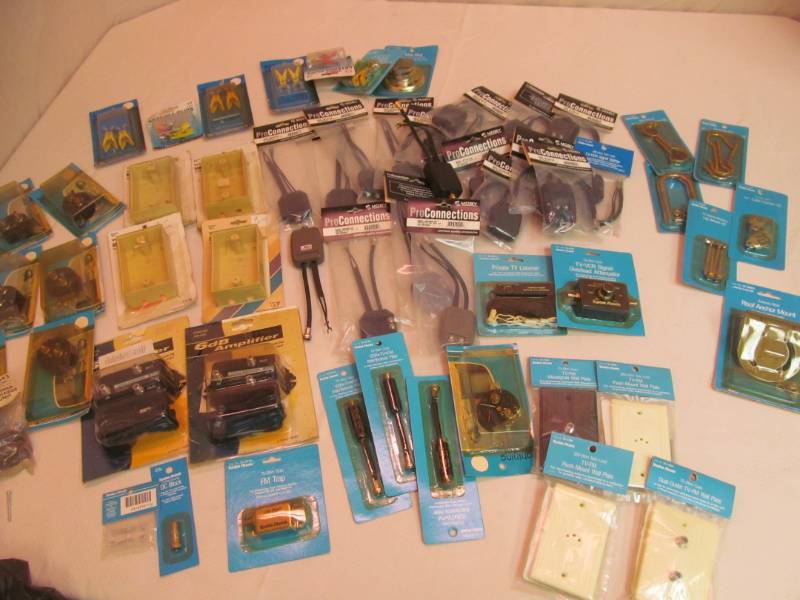lot 205 image: Large group of MIP TVVCRAntenna Splitters, Wall mount plates, Antenna Cips, Clamps, Archors, and more