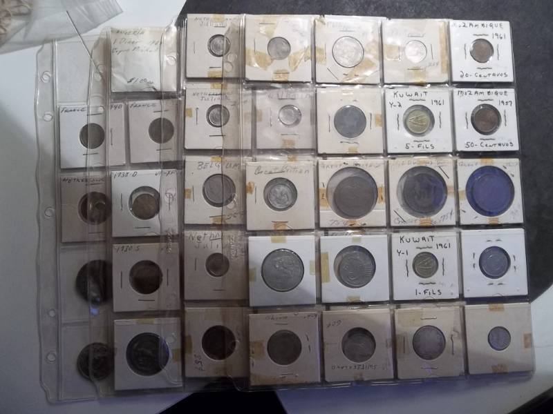 4 Pages Of Mixed Origin Mostly European Coins