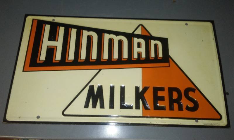 lot 201 image: Hinman milkers metal sign
