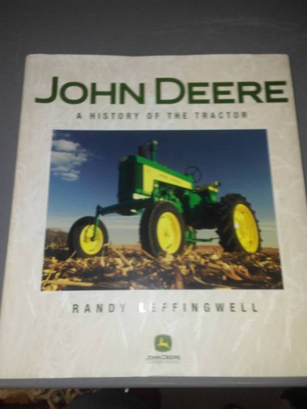 lot 204 image: John Deere book - history of the tractor.