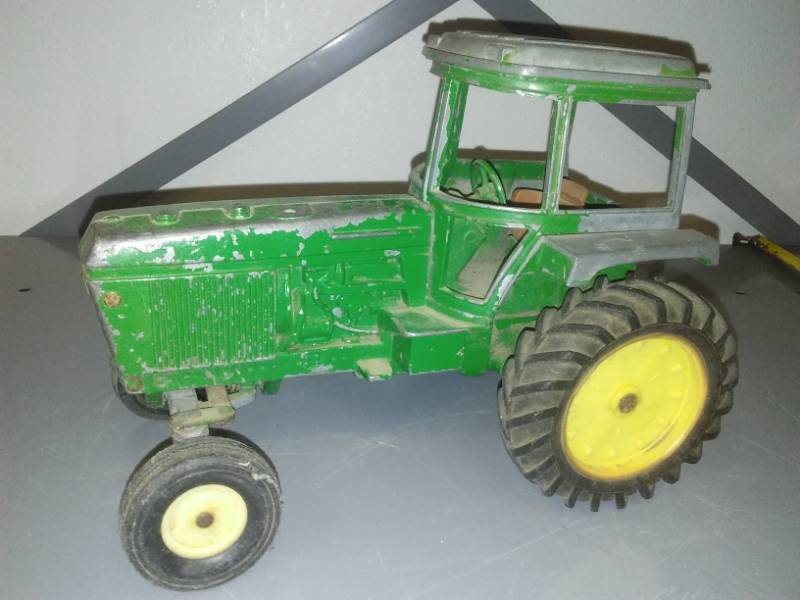 lot 224 image: John Deere tractor cab wide wheel