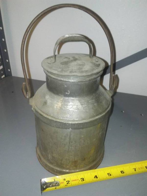 lot 232 image: 2 quart vintage metal cream milk can.
